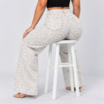 White Leopard jeans, Seated on stool